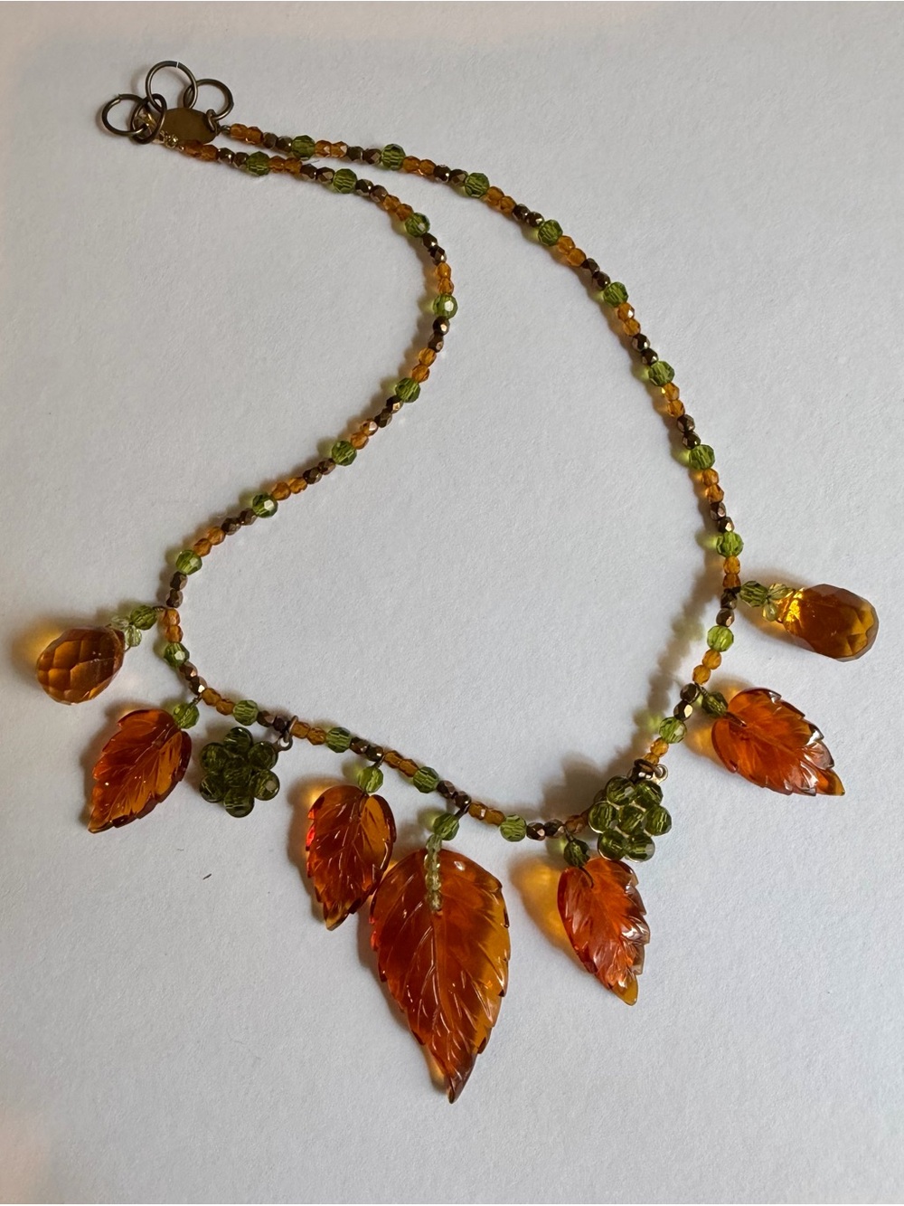 Amber-toned Leaf Glass Pendant Necklace - Unique, Playful, Light-catching!